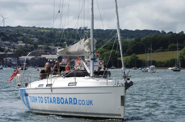 Turn to Starboard’s training yacht Bluster on the water in Falmouth Harbour, Copyright Turn to Starboard, All rights reserved